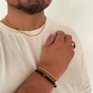 Stilrent armband i guldapläterad 925 sterling silver med klassisk Rope-länk och diskret berlock från Livingstone Wikh Accessories.