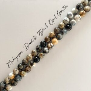 Astra Bracelet – stilrent armband i dendritisk svart opal med grå, svarta och beige nyanser samt gulddetaljer från Livingstone Wikh Accessories.